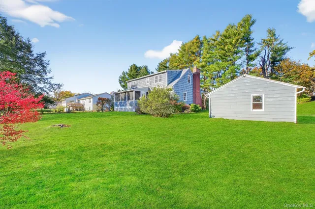 a front view of house with garden