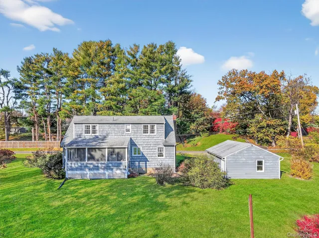 a view of a house with a big yard