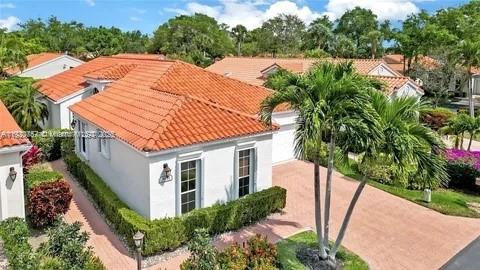 3951 Redondo Court Boca Raton, FL 33487 - Photo 2 of 30 a aerial view of a house with balcony and garden