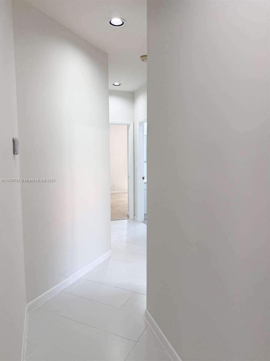 3951 Redondo Court Boca Raton, FL 33487 - Photo 27 of 30 a view of a hallway