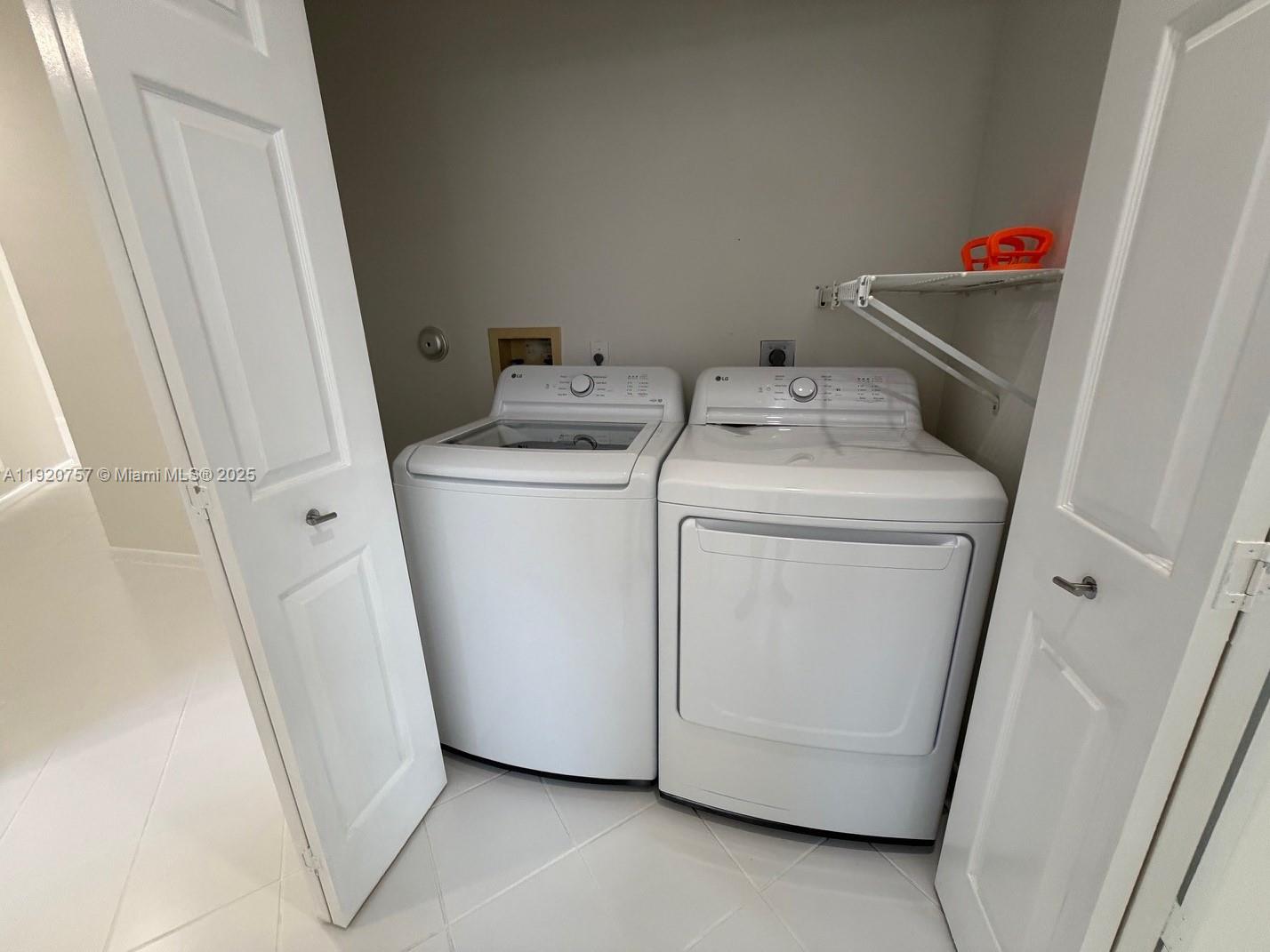 3951 Redondo Court Boca Raton, FL 33487 - Photo 30 of 30 a utility room with dryer and washer