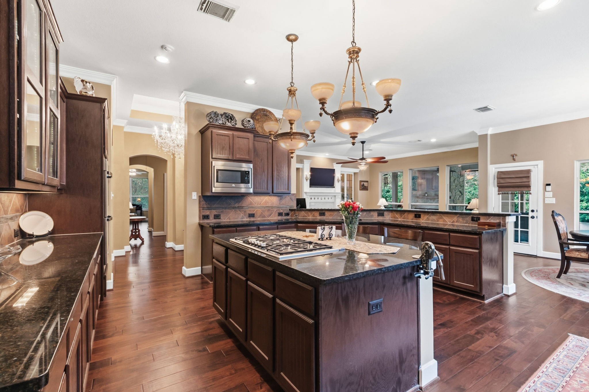 7514 Saddle Blanket Drive Waller, TX 77484 - Photo 17 of 50 Another view of this amazing kitchen. Plenty of counter space for your meal prep. The utility sink will aid in your meal prep! There is room for several cooks in this kitchen.