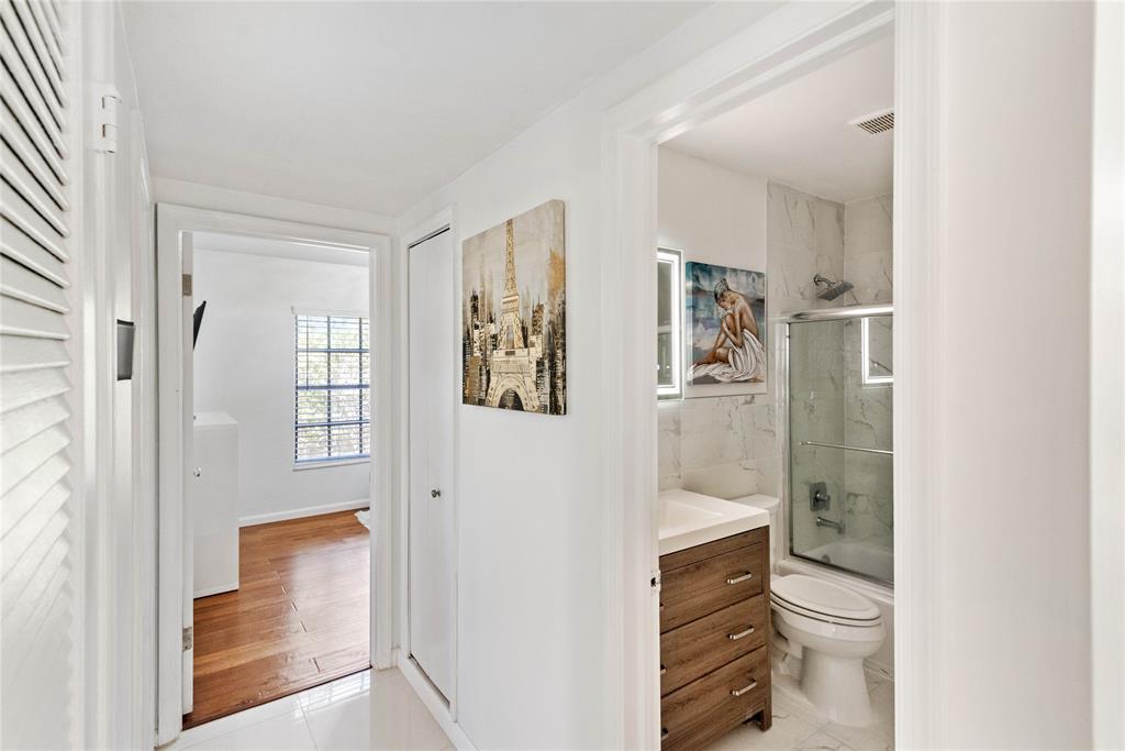 2151 Northeast 68th Street Fort Lauderdale, FL 33308 - Photo 15 of 45 a bathroom with a shower toilet and sink