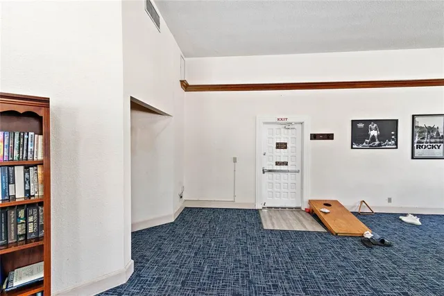 a view of a book shelf with lots of books