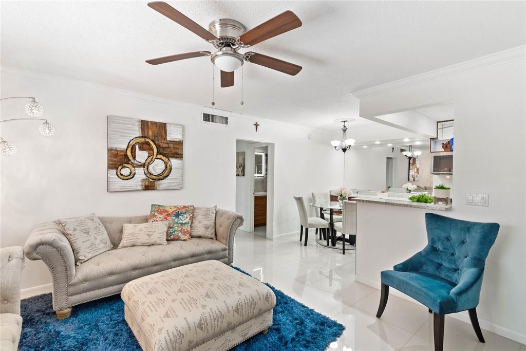2151 Northeast 68th Street Fort Lauderdale, FL 33308 - Photo 3 of 45 a living room with furniture and wooden floor