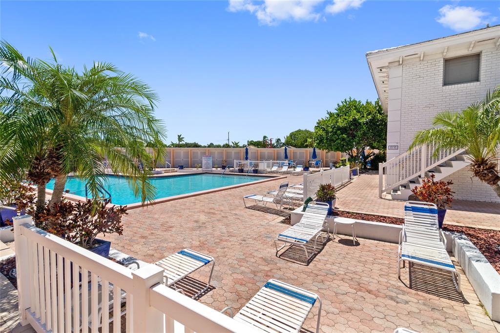 2151 Northeast 68th Street Fort Lauderdale, FL 33308 - Photo 32 of 45 a view of a terrace with wooden fence