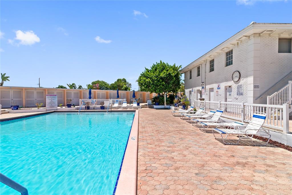 2151 Northeast 68th Street Fort Lauderdale, FL 33308 - Photo 33 of 45 a view of a patio next to a yard