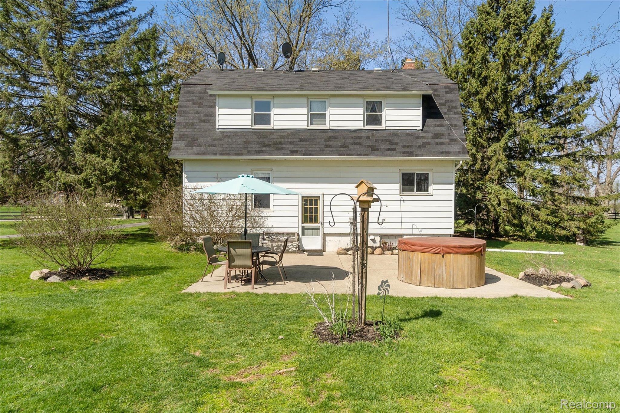 18900 Bradley Road Gregory, MI 48137 - Photo 35 of 56 Back View of Home
