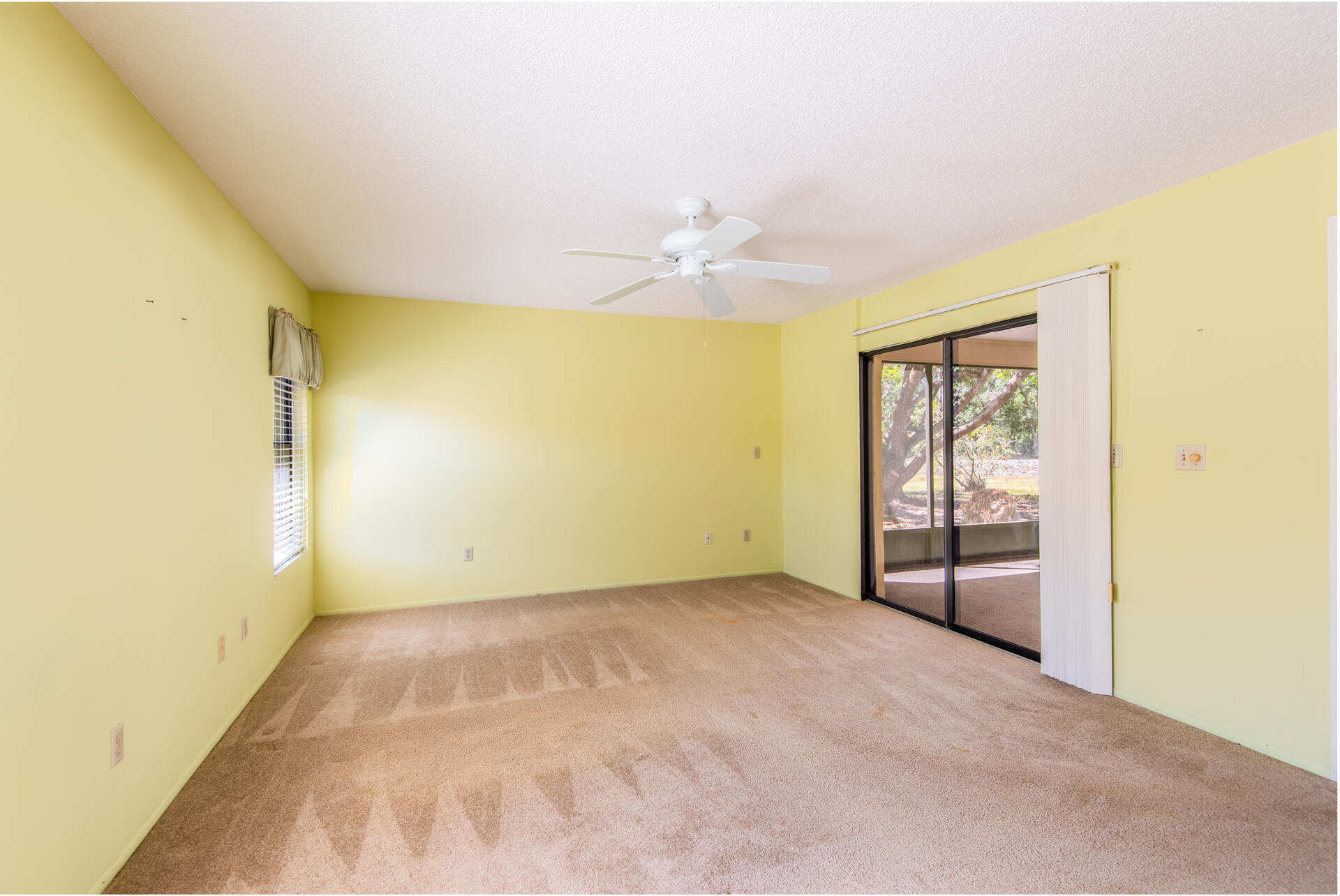 248 Rheine Road Northwest Palm Bay, FL 32907 - Photo 15 of 22 a view of an empty room with a window