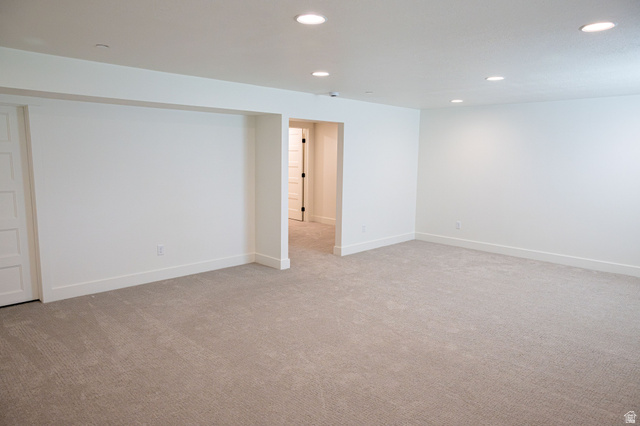 2218 South 635 West, Unit A Perry, UT 84302 - Photo 13 of 18 Spacious room with recessed lighting, light gray carpet, and white walls