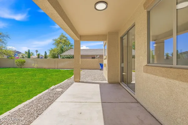 a view of a house with backyard