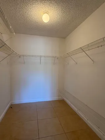 a view of a room with racks on the wall