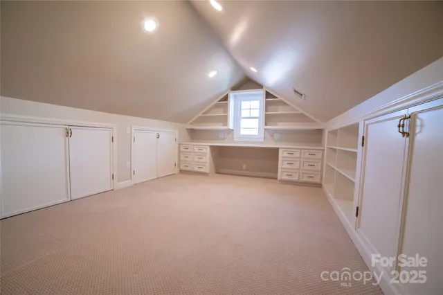 a workspace with furniture and window