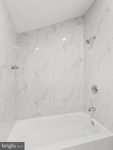 a bathroom with a bathtub