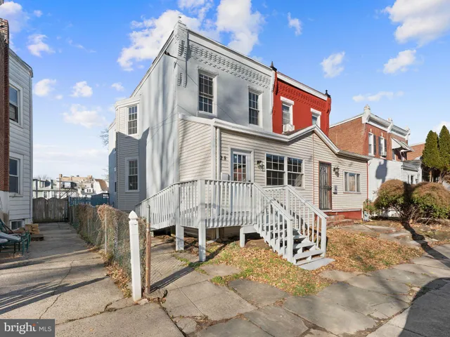 a front view of a house with a porch