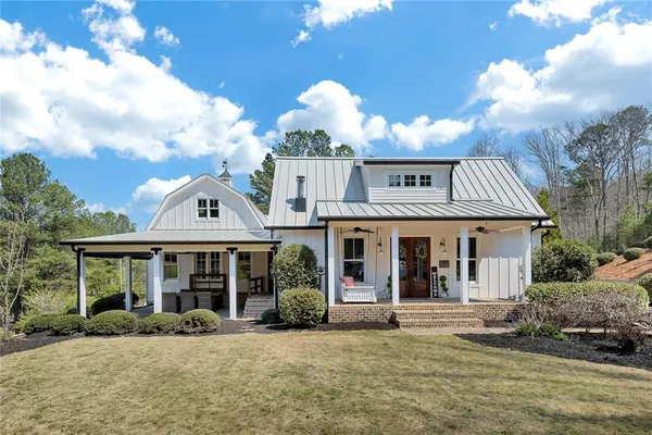 front view of a house with a yard