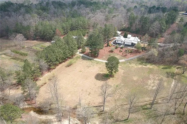 a view of a backyard of the house