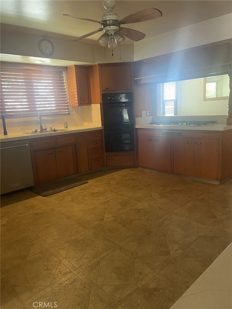 319 Tocino Drive Duarte, CA 91010 - Photo 8 of 23 a view of an empty room with window and cabinet