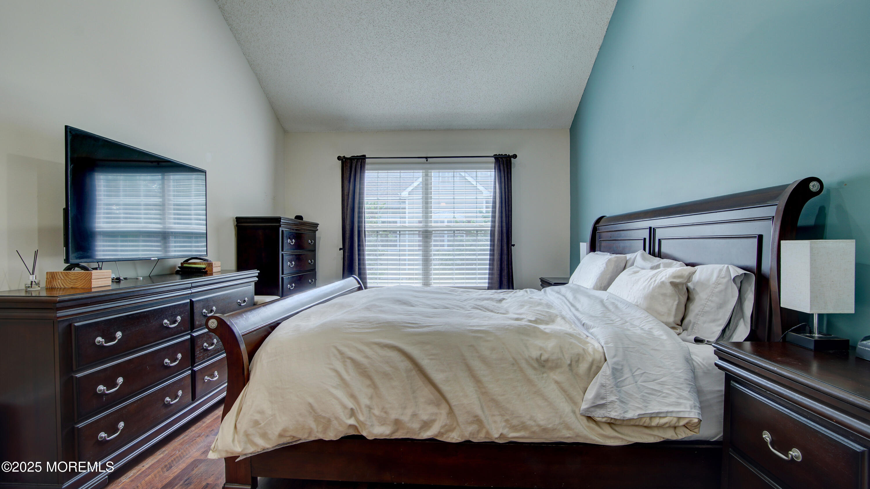 53 Winged Foot Court Howell, NJ 07731 - Photo 16 of 28 a bedroom with a bed and a television
