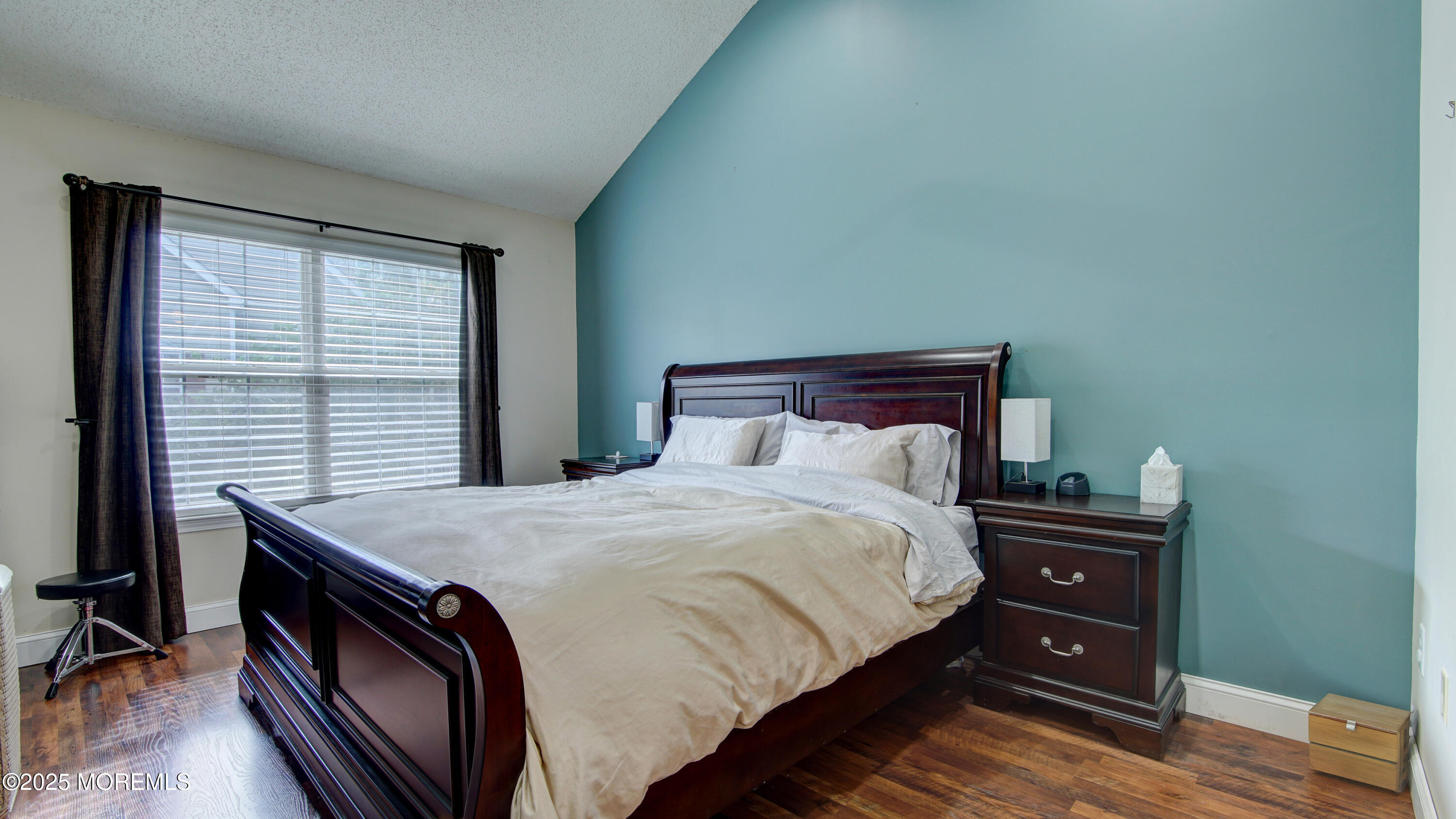 53 Winged Foot Court Howell, NJ 07731 - Photo 17 of 28 a bed sitting in a bedroom next to a window
