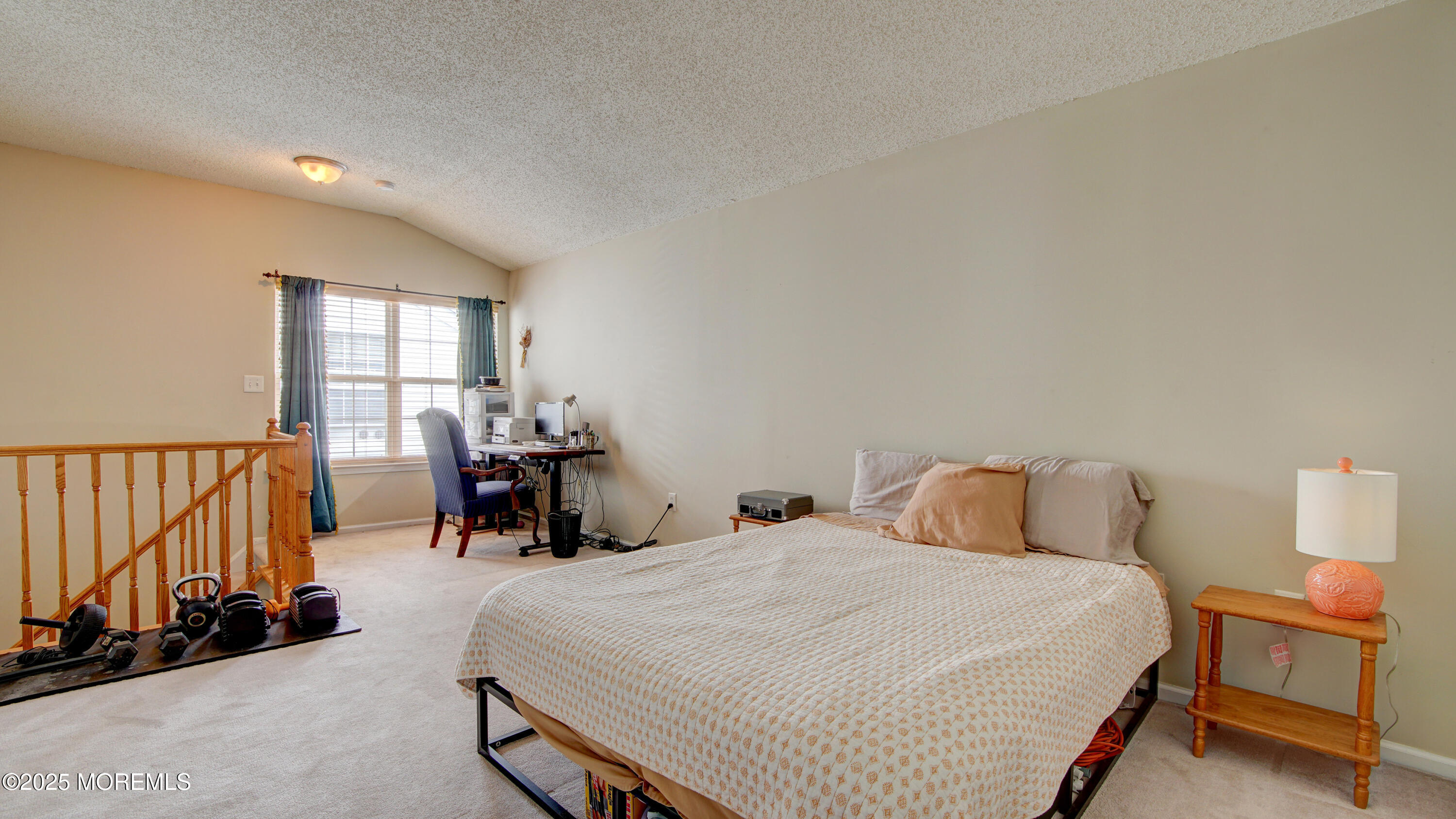 53 Winged Foot Court Howell, NJ 07731 - Photo 22 of 28 a bed room with a bed and a chair