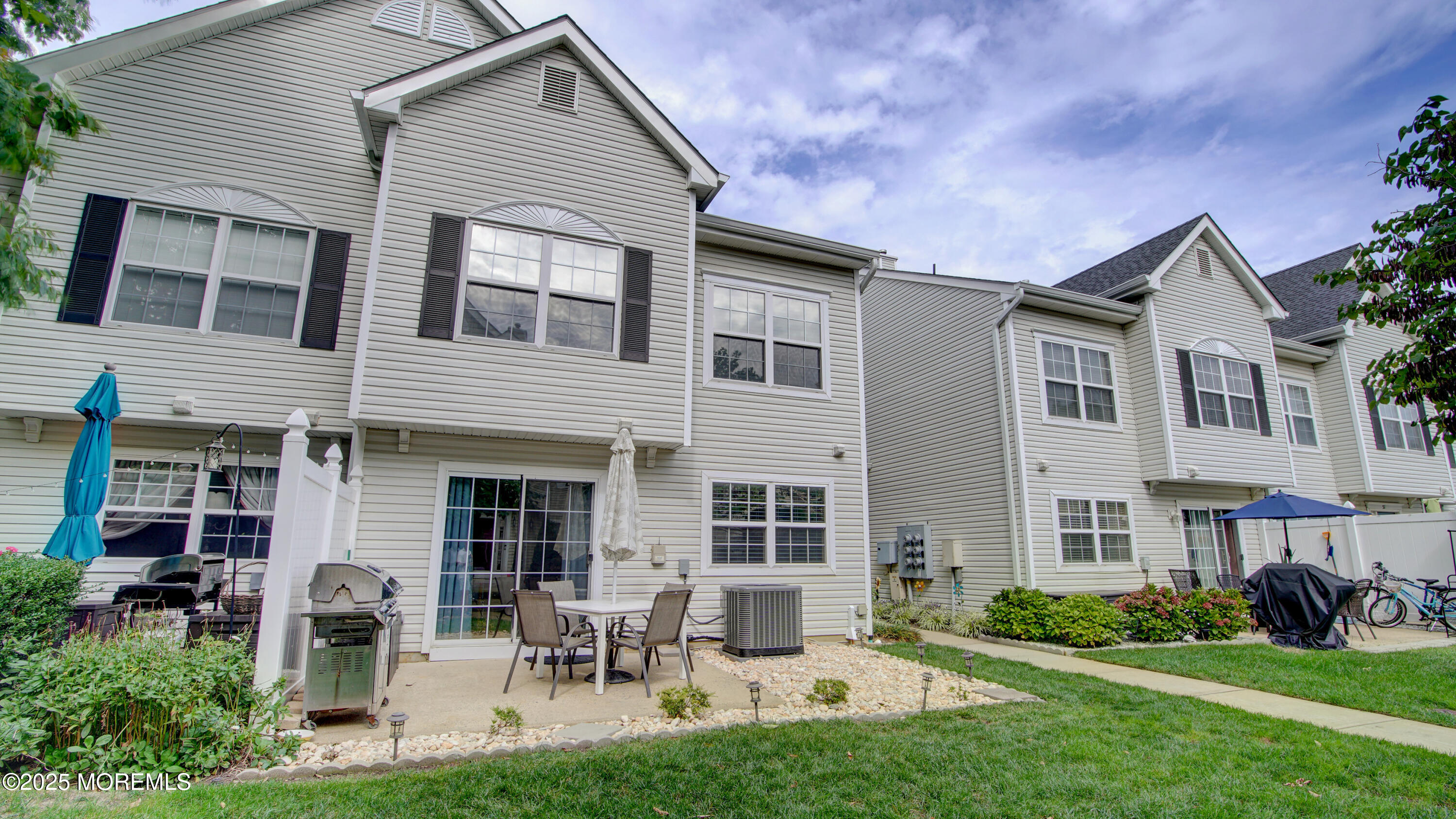 53 Winged Foot Court Howell, NJ 07731 - Photo 24 of 28 a front view of a house with garden and porch