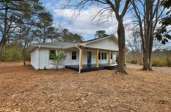 2708 Ellis Road Northwest Kennesaw, GA 30152 - Photo 1 of 1 a view of a house with a yard