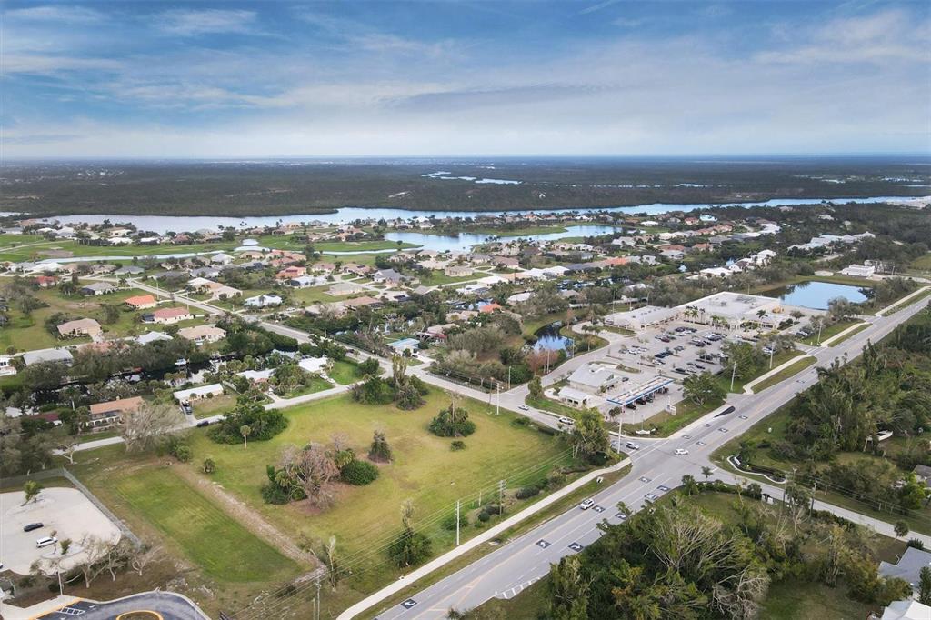 8625 Placida Road Placida, FL 33946 - Photo 7 of 15 an aerial view of residential houses with outdoor space