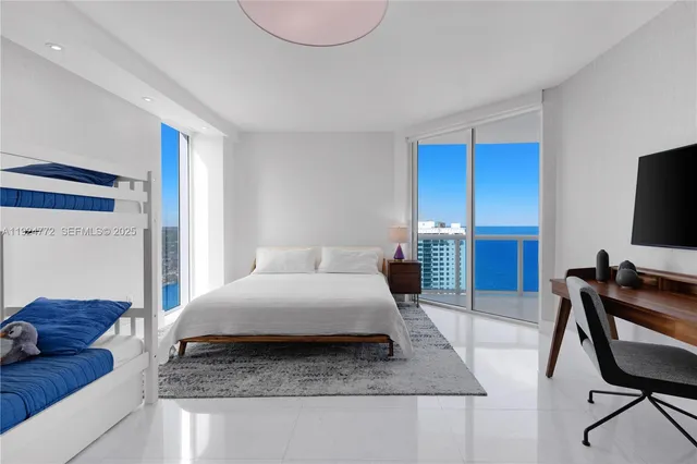 a view of hallway with cabinets