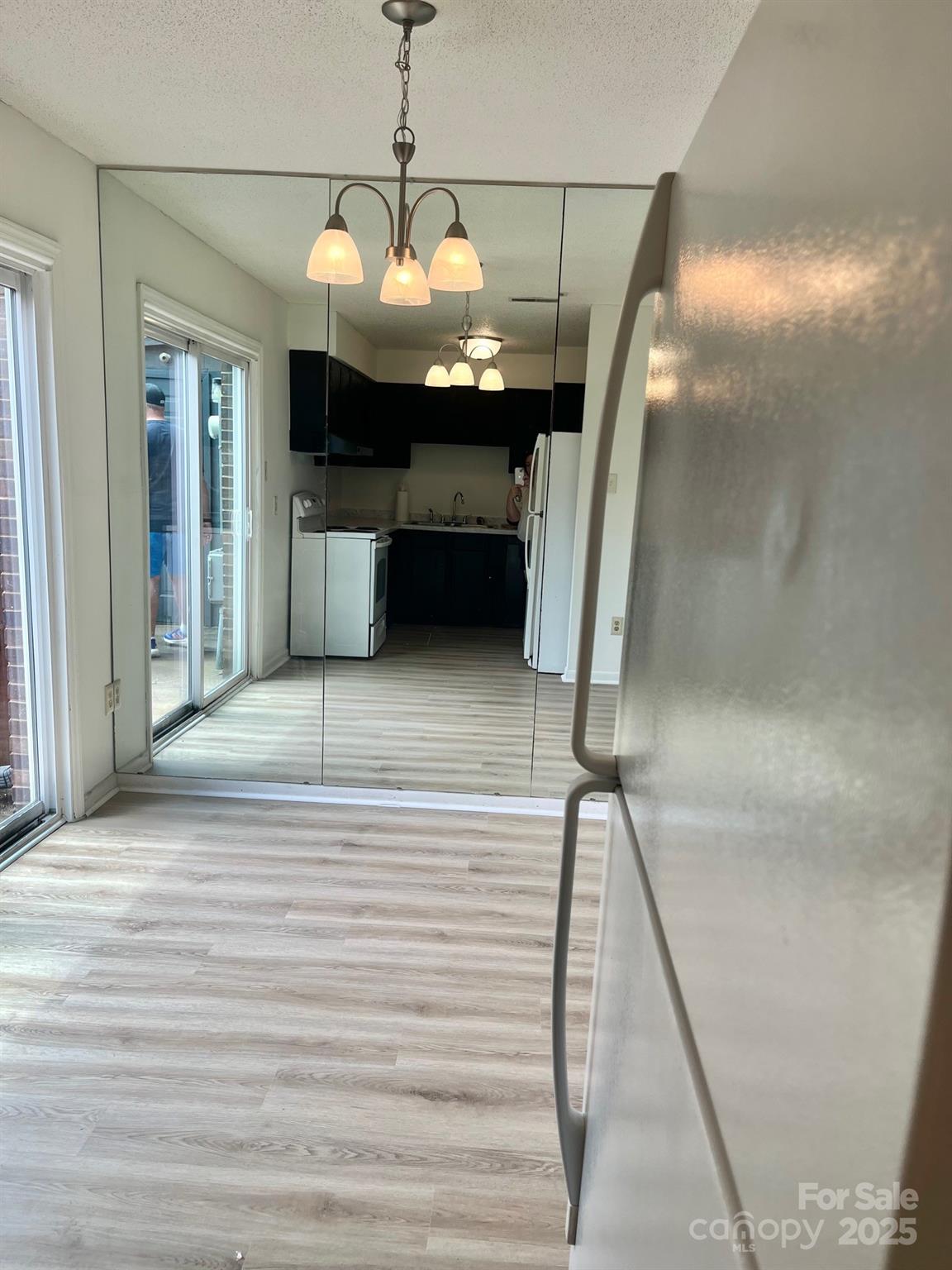 4520 Central Avenue, Unit C Charlotte, NC 28205 - Photo 3 of 18 a view of a livingroom with a furniture wooden floor and window