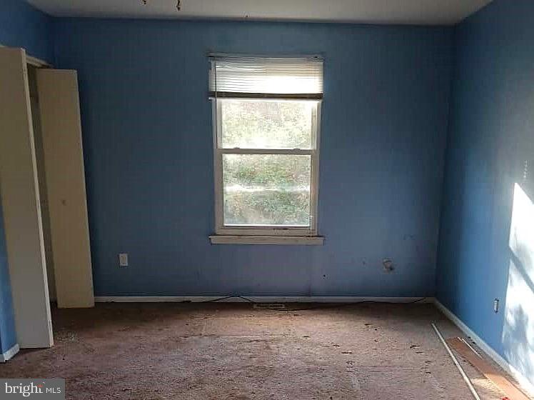 554 Old Beaver Dam Road Port Norris, NJ 08349 - Photo 3 of 10 a view of an empty room with a window
