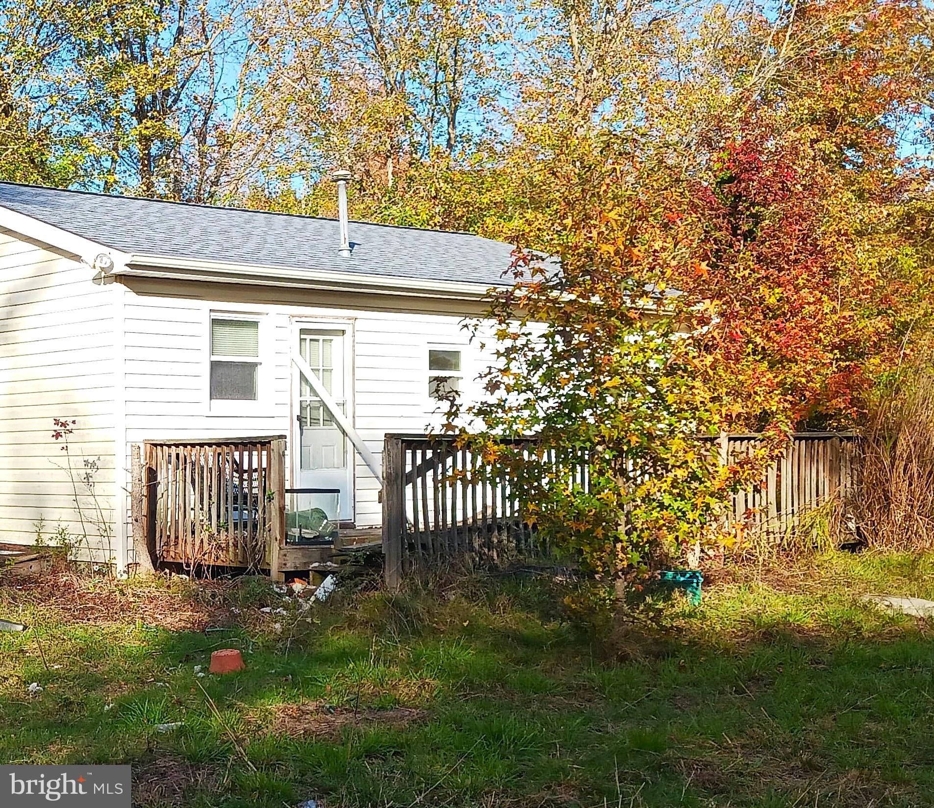 554 Old Beaver Dam Road Port Norris, NJ 08349 - Photo 8 of 10 a front view of a house with a garden