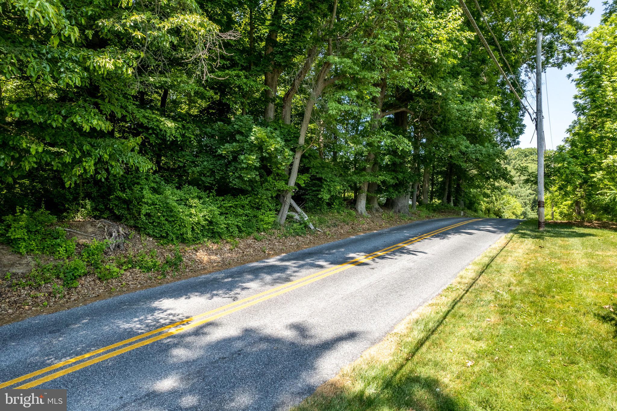 765 Folly Hill Road Kennett Square, PA 19348 - Photo 2 of 3 a view of a backyard