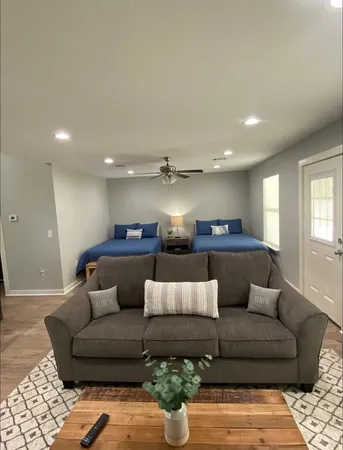a living room with furniture and a couch