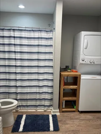 a bathroom with a toilet and a sink