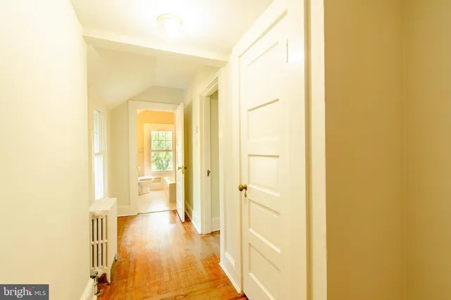 a view of a bathroom with a shower and a sink
