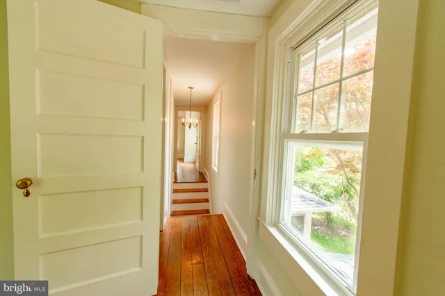 a view of a bathroom with a glass door