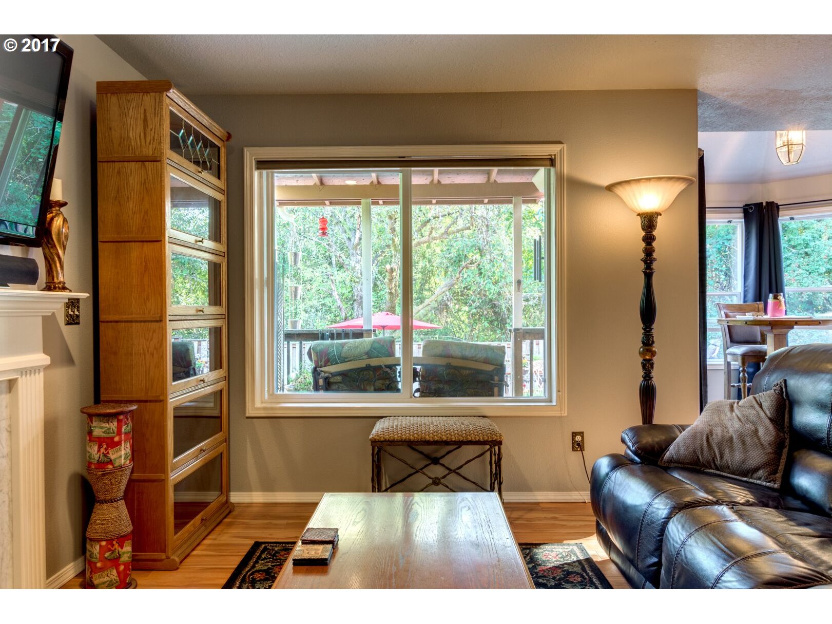 18420 Southwest Colfelt Lane Sherwood, OR 97140 - Photo 12 of 32 a living room with furniture and a large window