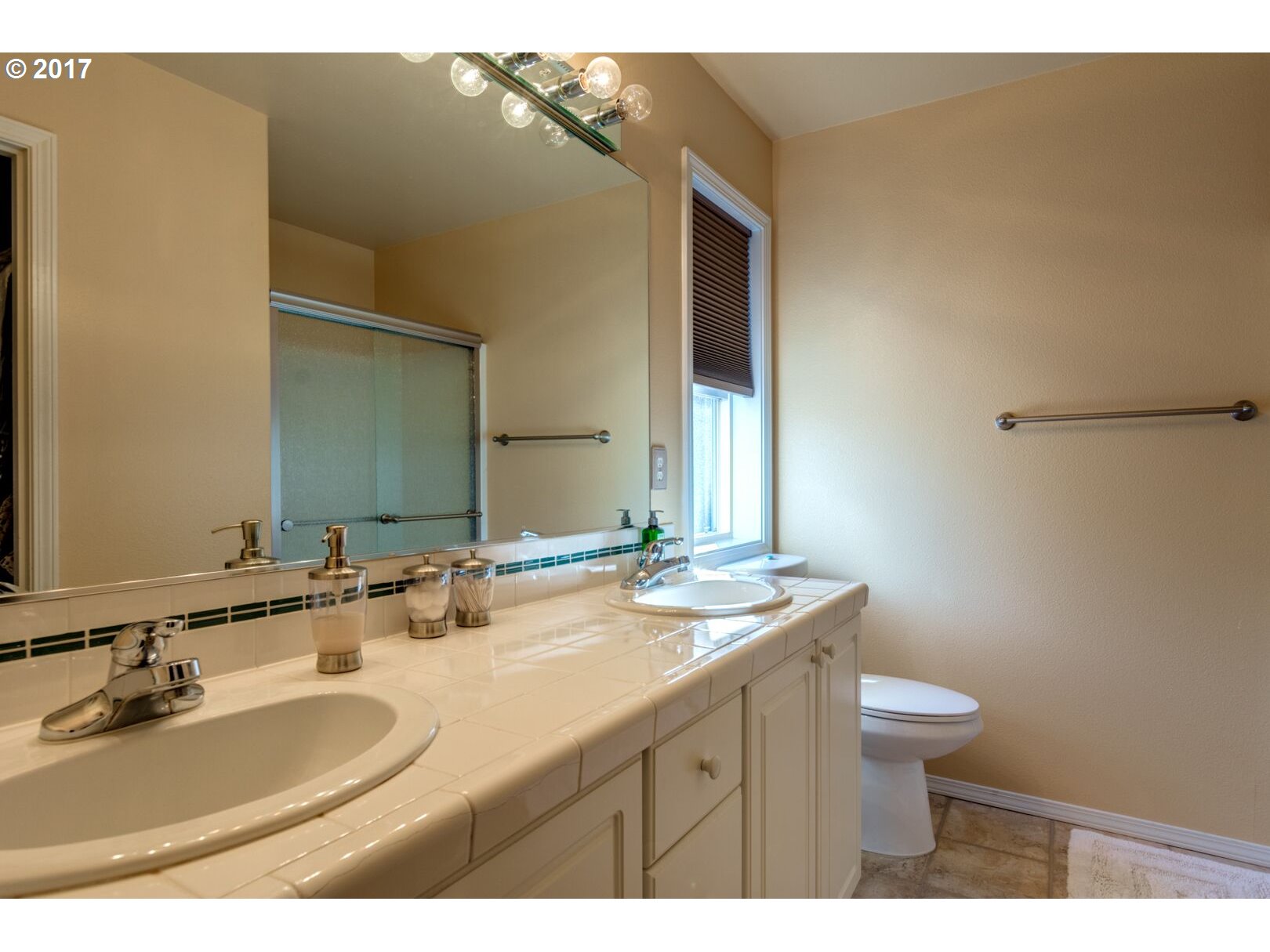 18420 Southwest Colfelt Lane Sherwood, OR 97140 - Photo 17 of 32 a bathroom with a sink and a mirror