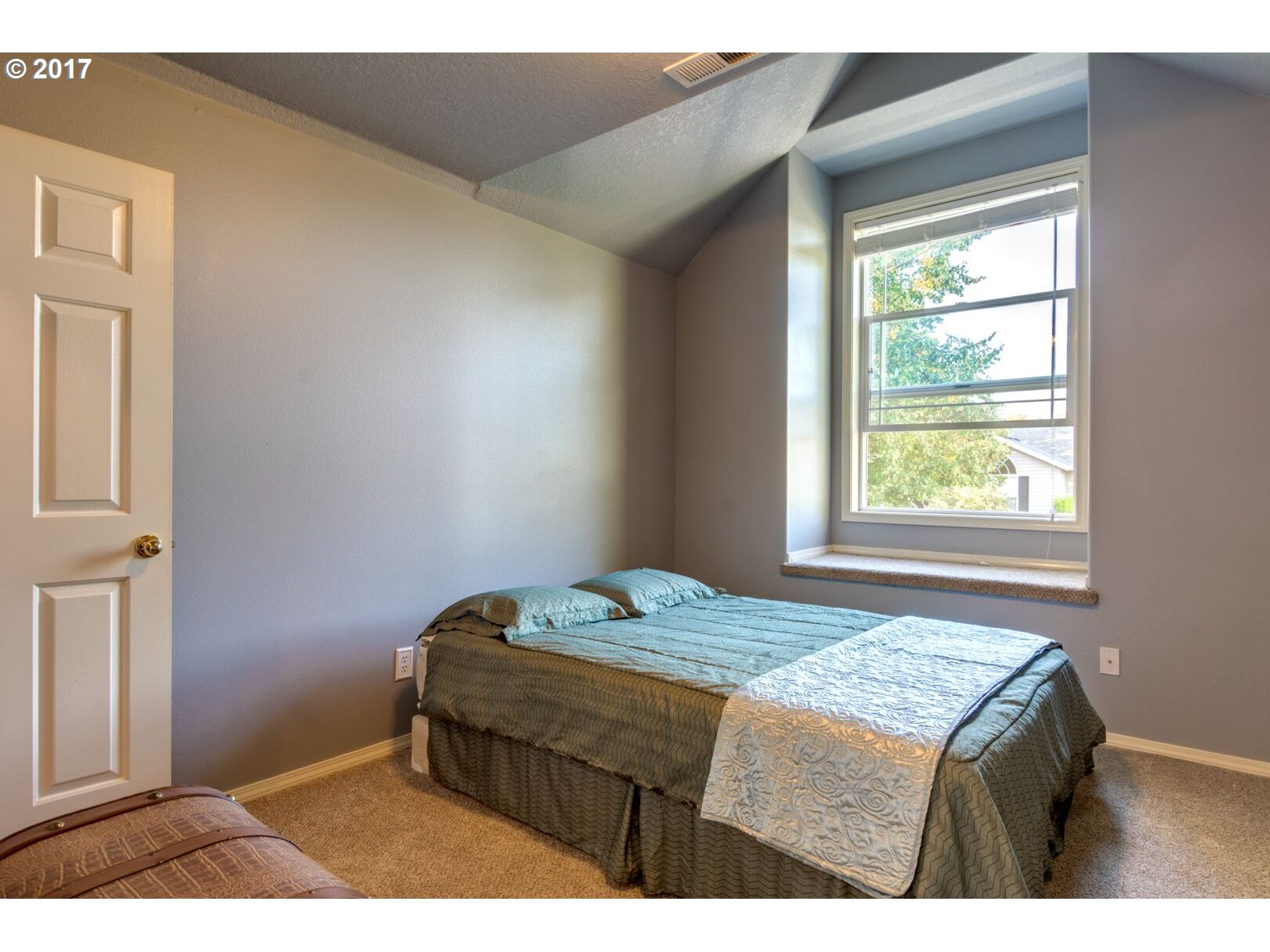 18420 Southwest Colfelt Lane Sherwood, OR 97140 - Photo 18 of 32 a bedroom with a bed and a window