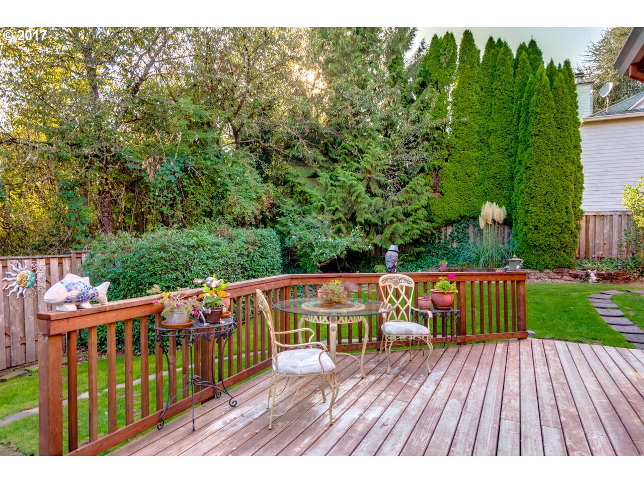 18420 Southwest Colfelt Lane Sherwood, OR 97140 - Photo 23 of 32 a view of a wooden deck with a yard