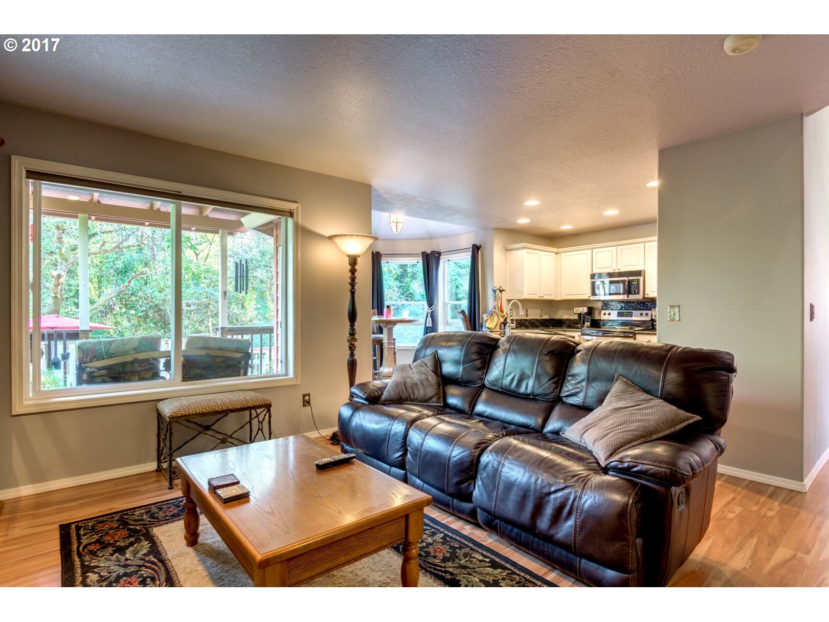 18420 Southwest Colfelt Lane Sherwood, OR 97140 - Photo 10 of 32 a living room with furniture and a large window
