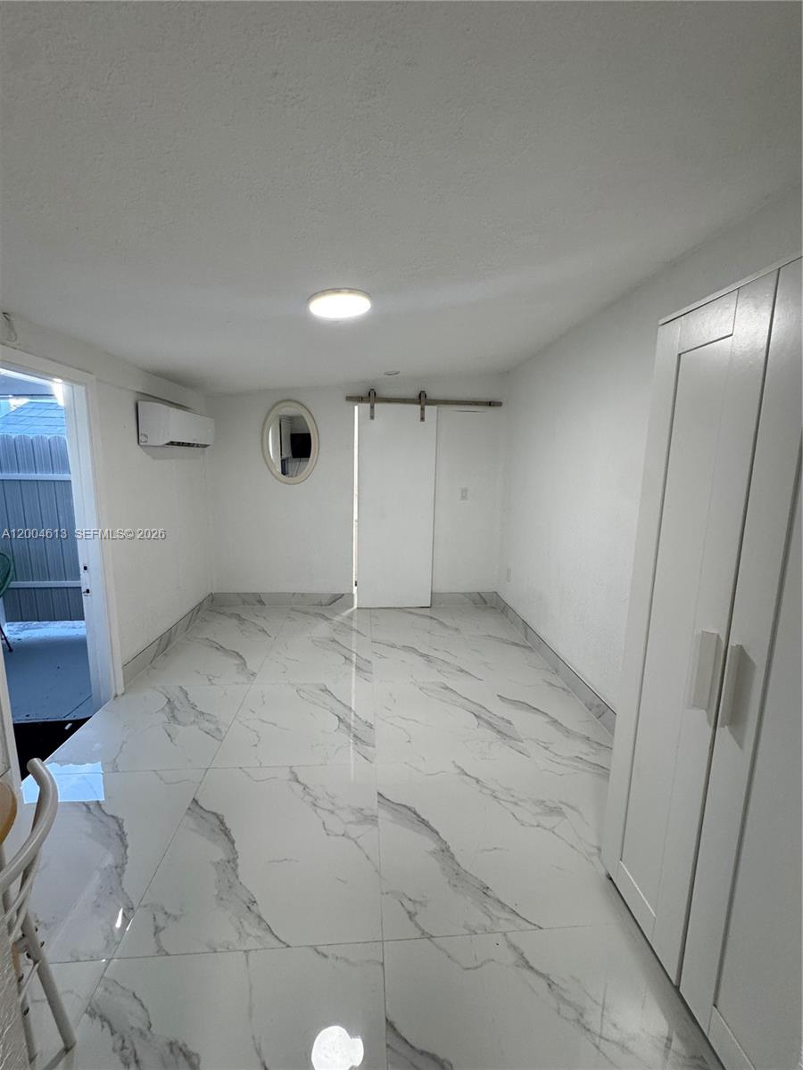 2796 Southwest 34th Court Miami, FL 33133 - Photo 2 of 8 a view of an empty room