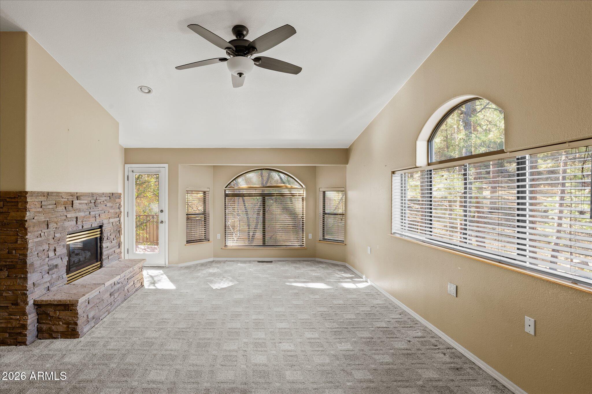 1466 East Valley View Road Prescott, AZ 86303 - Photo 19 of 31 a view of empty room with a fireplace