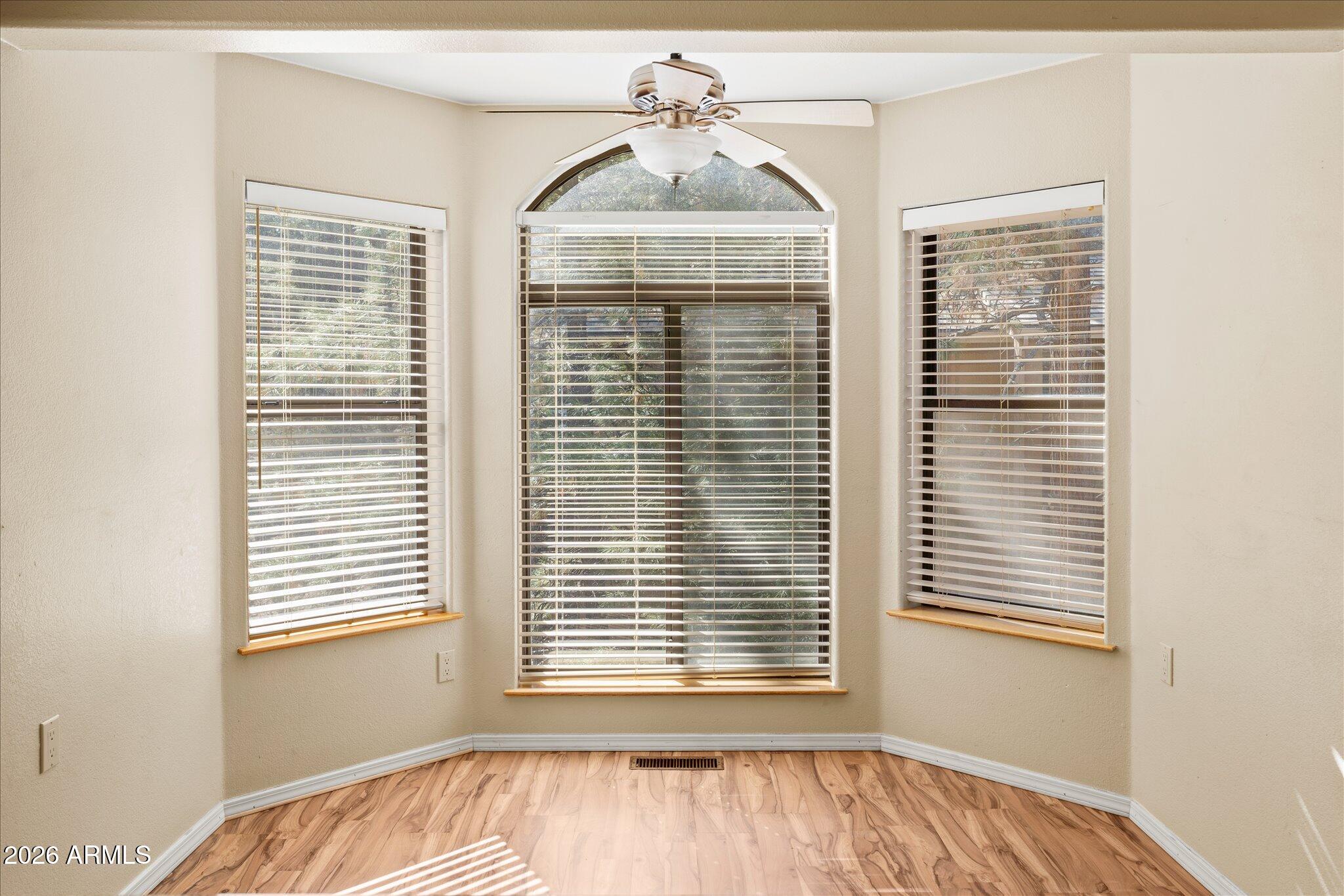 1466 East Valley View Road Prescott, AZ 86303 - Photo 20 of 31 a view of an empty room with a window