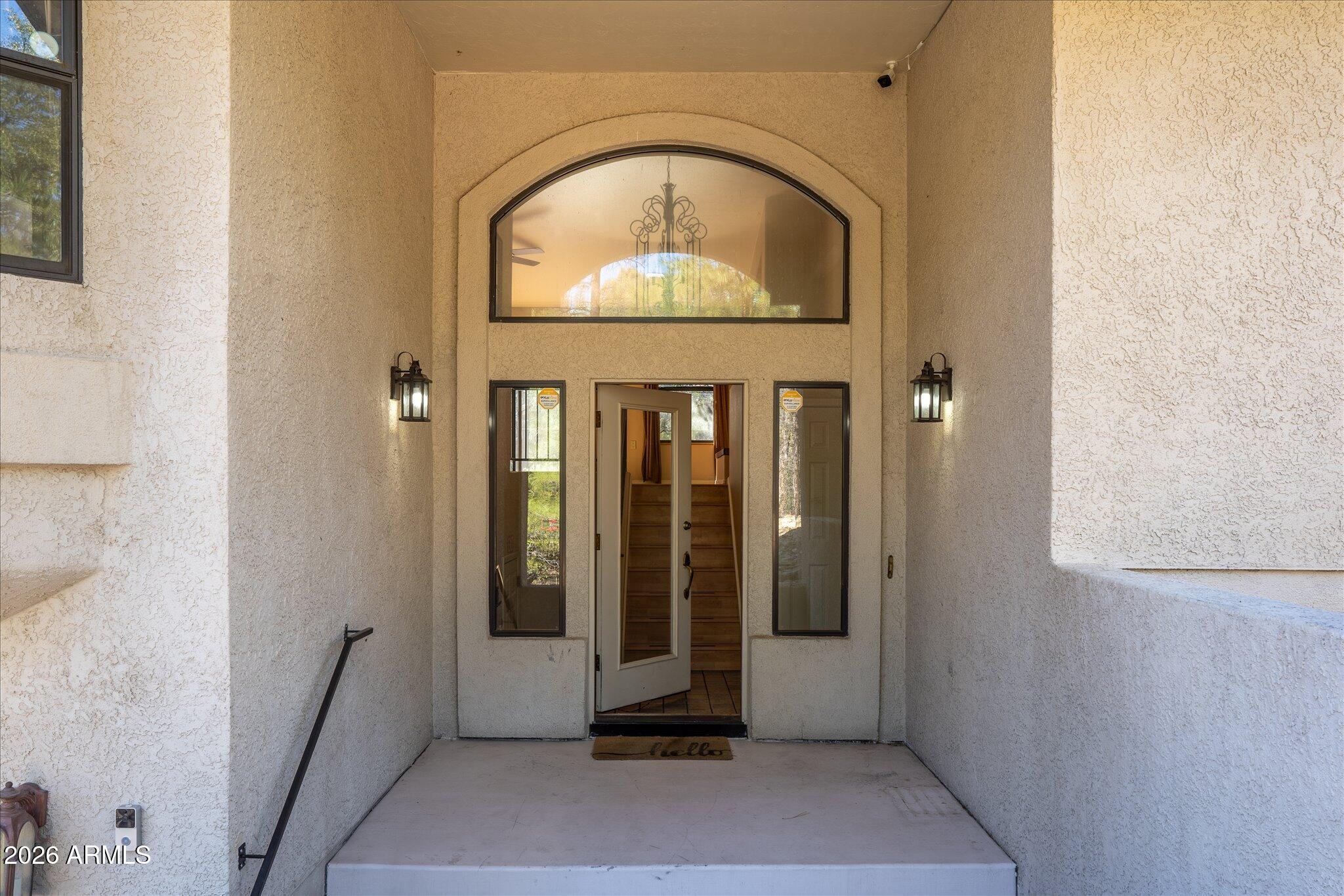 1466 East Valley View Road Prescott, AZ 86303 - Photo 2 of 31 a view of a door house with a door