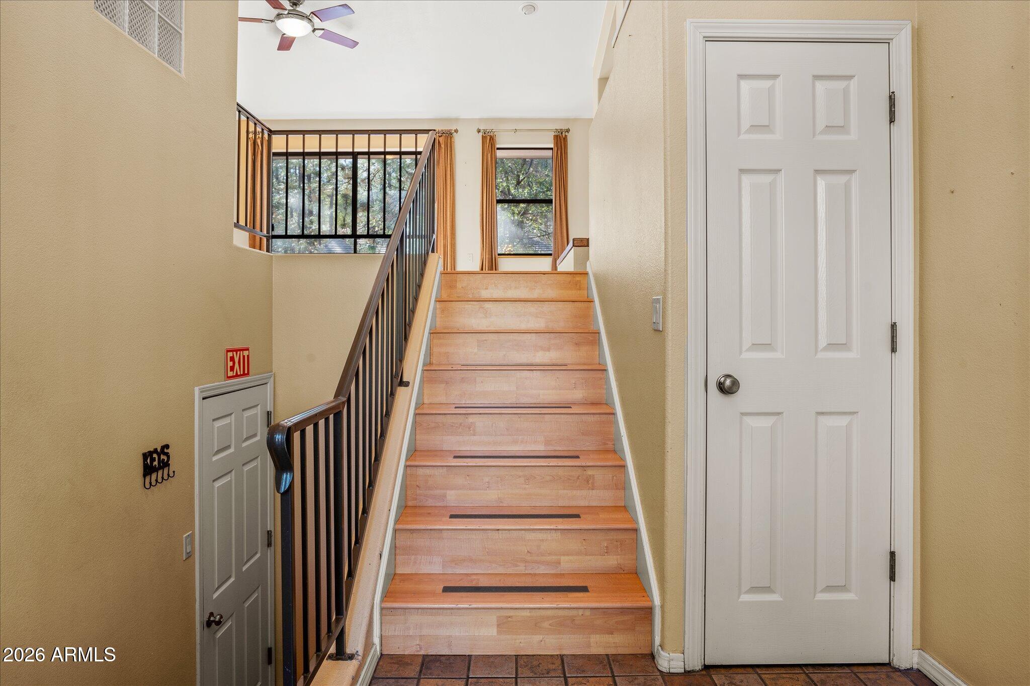 1466 East Valley View Road Prescott, AZ 86303 - Photo 3 of 31 a view of a hallway with wooden floor and entryway
