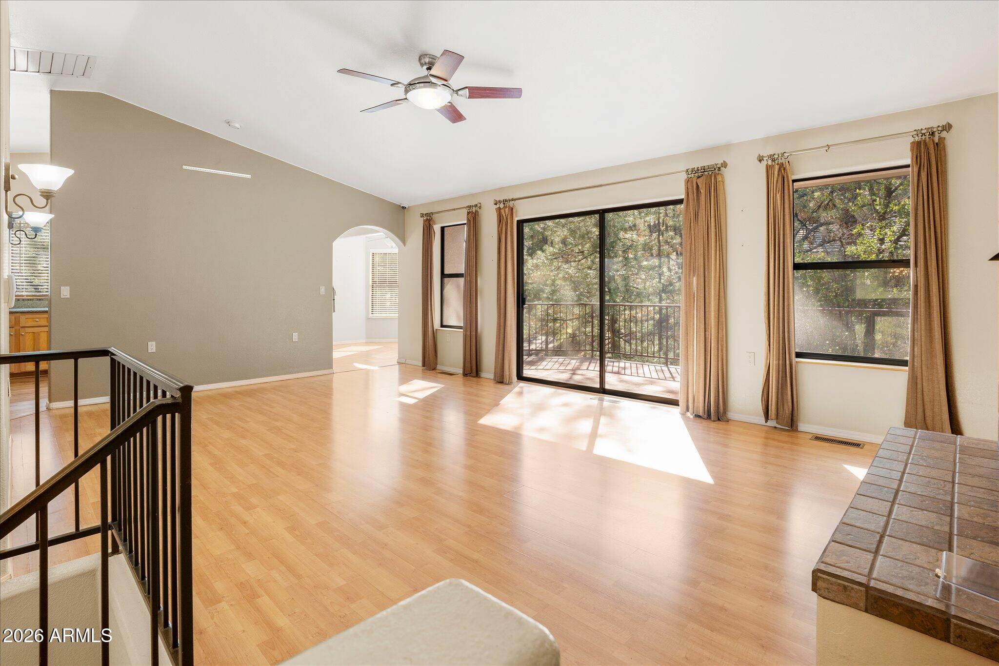1466 East Valley View Road Prescott, AZ 86303 - Photo 4 of 31 a view of an empty room with glass door