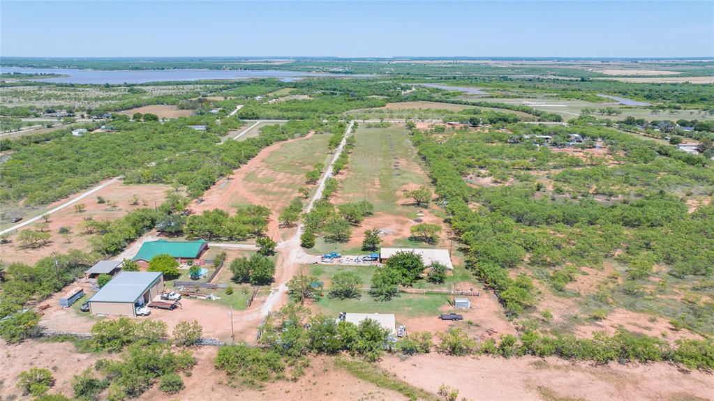 6702 West Lake Road Abilene, TX 79601 - Photo 18 of 21 a view of an outdoor space and a lake view