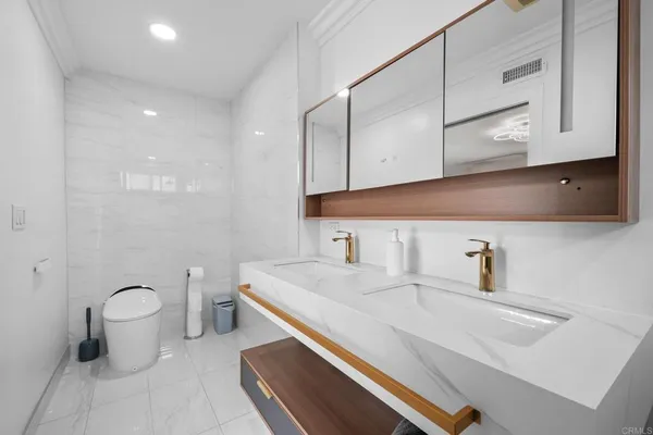 a bathroom with a sink and a toilet